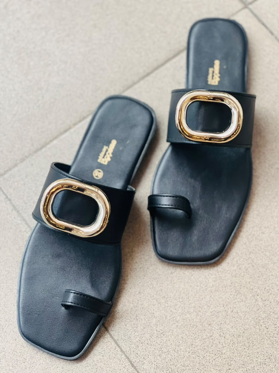 BLACK STATEMENT BUCKLE TOE RING SLIP ONS