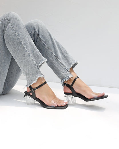 TRANSPARENT OPEN TOE LOW BLOCK HEELS IN BLACK