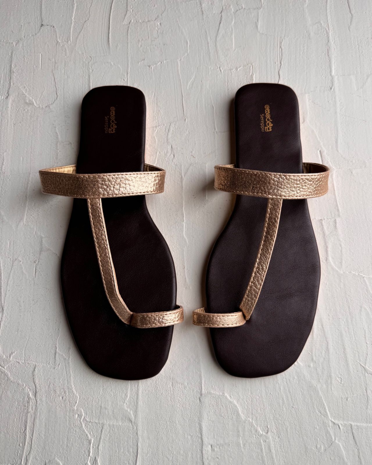 GOLD TOE RING SLIP ONS.