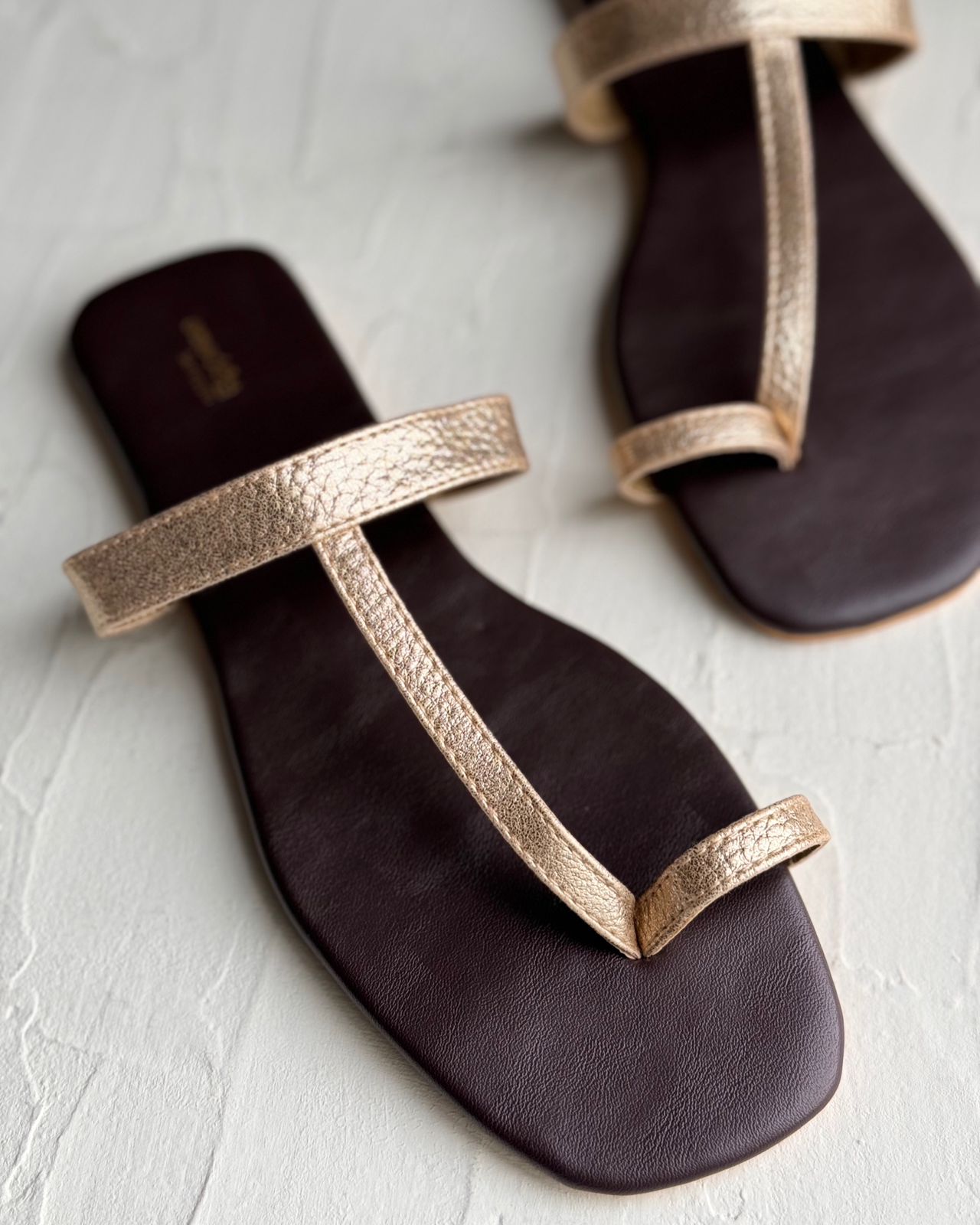 GOLD TOE RING SLIP ONS.