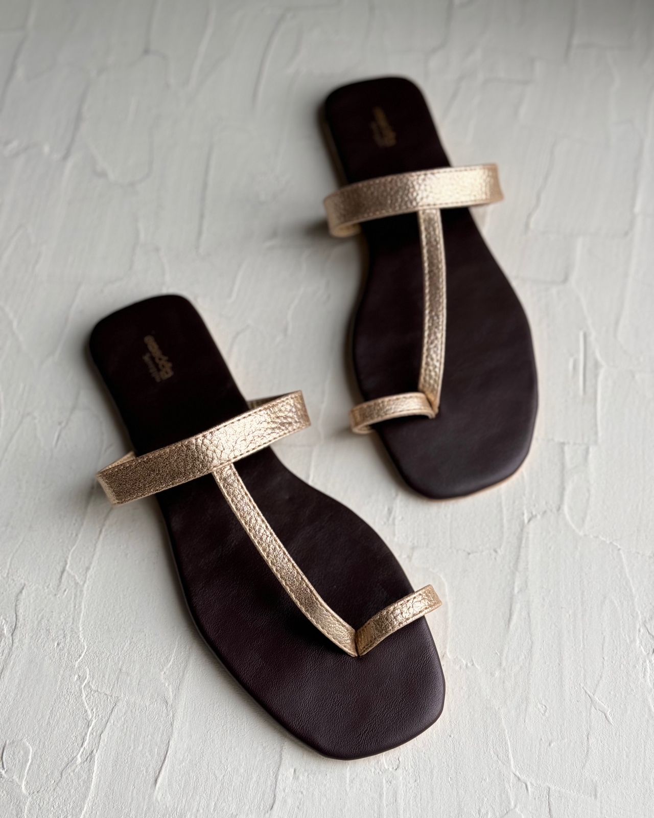 GOLD TOE RING SLIP ONS.